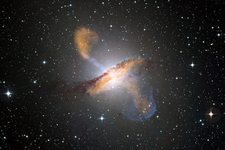 jets from black hole in Centaurus A.  Credit: ESO/WFI (visible); MPIfR/ESO/APEX/A.Weiss et al. (microwave); NASA/CXC/CfA/R.Kraft et al. (X-ray)